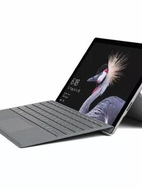 Microsoft Surface with Gray Keyboard Cover and Touchscreen